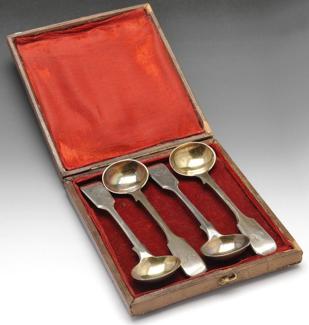 A Victorian cased set of four silver salt spoons.: A Victorian silver cased set of four salt spoons, each in plain Fiddle pattern with initialled terminal. Hallmarked Chawner & Co (George William Adams), London 1866. Weight 1.76 ozt (55 grams).