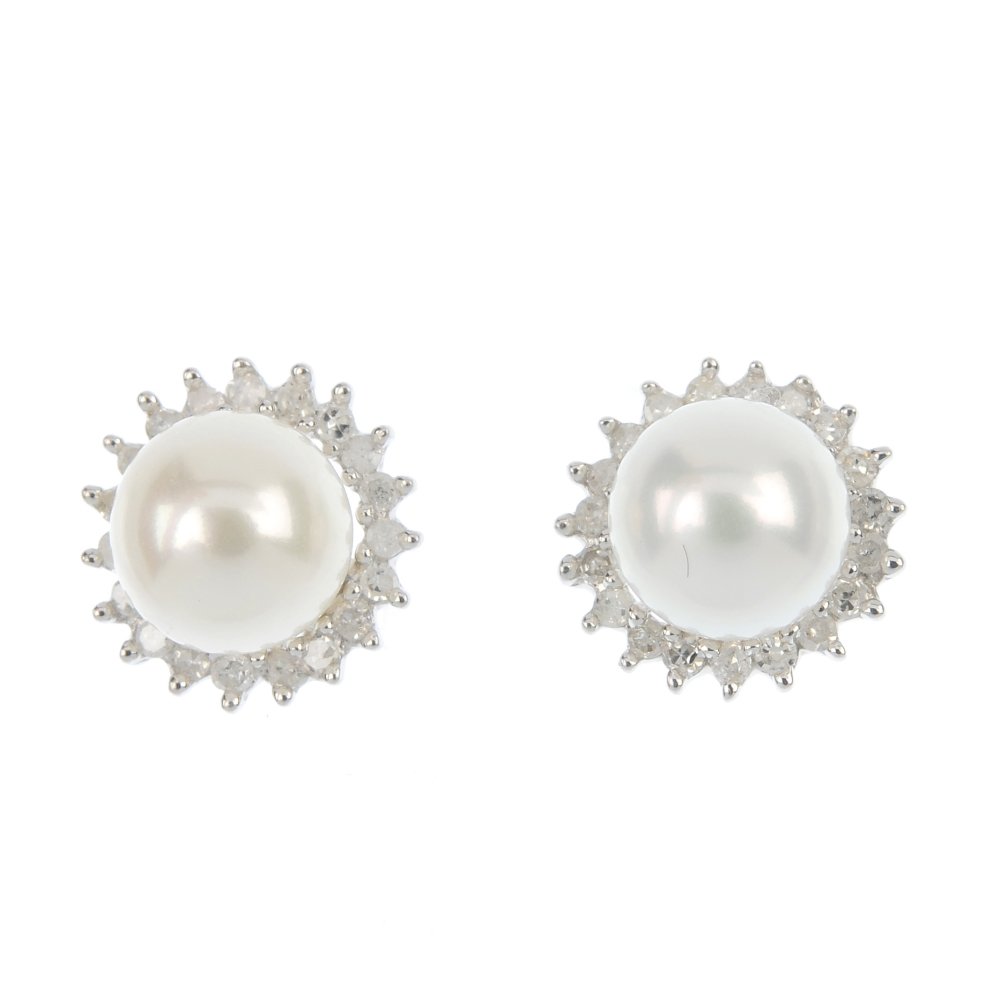 A selection of three pairs of diamond and gem-set: A selection of three pairs of diamond and gem-set earrings. To include a pair of cultured pearl and diamond cluster ear studs, a pair of green paste and diamond cluster ear studs, together with a pair