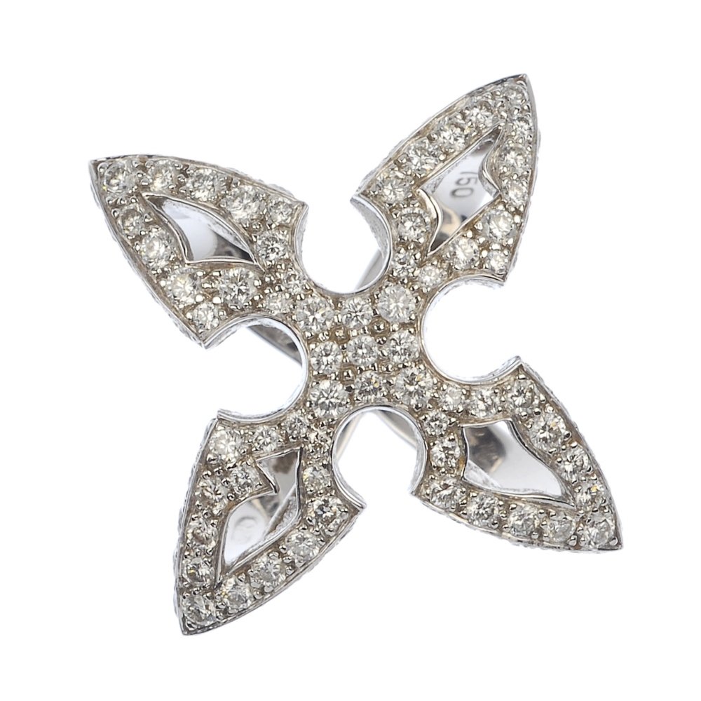 (122846-1-A) STEPHEN WEBSTER - an 18ct gold diamond: (122846-1-A) STEPHEN WEBSTER - an 18ct gold diamond ring. Of openwork design, the brilliant-cut diamond scalloped cross-shape panel, to the similarly-set sides. Maker's marks for Stephen Webster. Esti