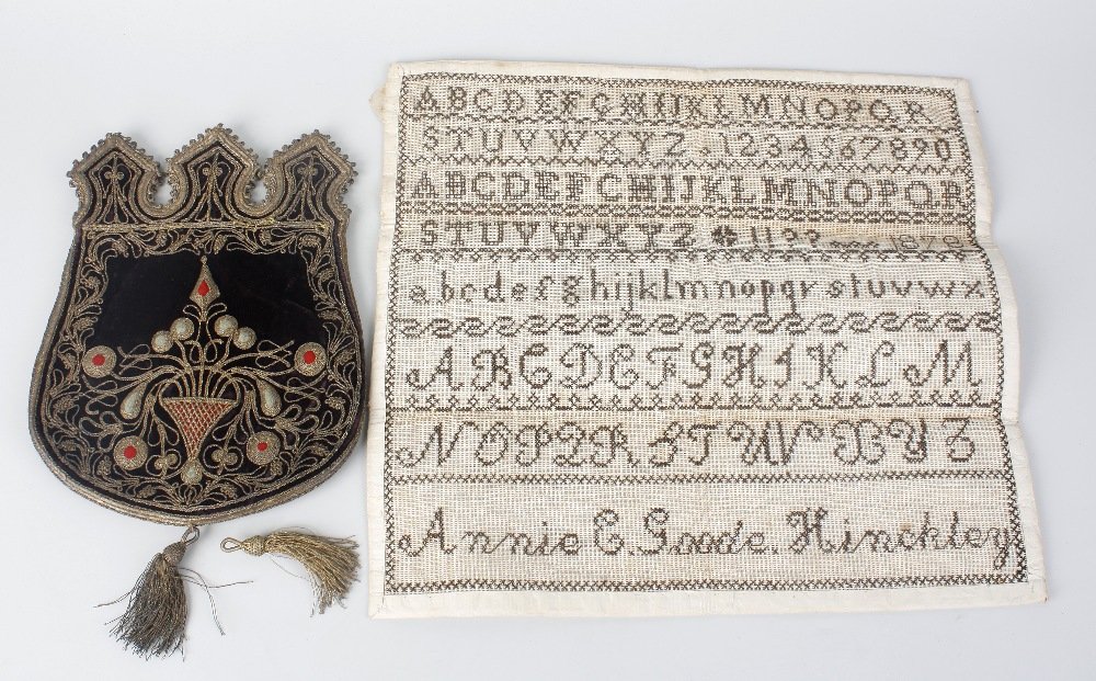 An embroidered velvet purse, probably 18th century: An embroidered velvet purse, probably 18th century, worked in gilt thread with red and green highlights, beneath castellated top, 8" (20.5cm) high excluding tasse, together with a late 19th century un