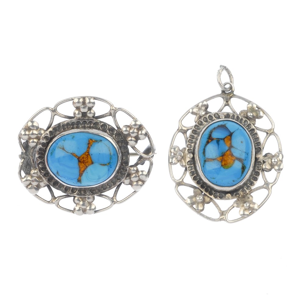 BERNARD INSTONE (attributed to) - a glass pendant and: BERNARD INSTONE (attributed to) - a mottled blue and golden glass cabochon pendant within a floral surround, together with a similarly-designed brooch. Stamped Sterling Silver. Lengths 3.1 and 3.8cms.