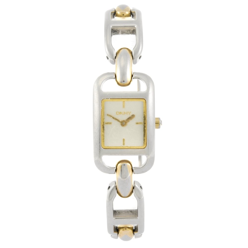 (230975887) DKNY - a lady's bracelet watch.: (230975887) DKNY - a lady's bracelet watch. Numbered NY-3147. Unsigned quartz movement. Silvered dial with quarterly baton hour markers. Stainless steel case fitted to a bi-colour bracelet with foldin