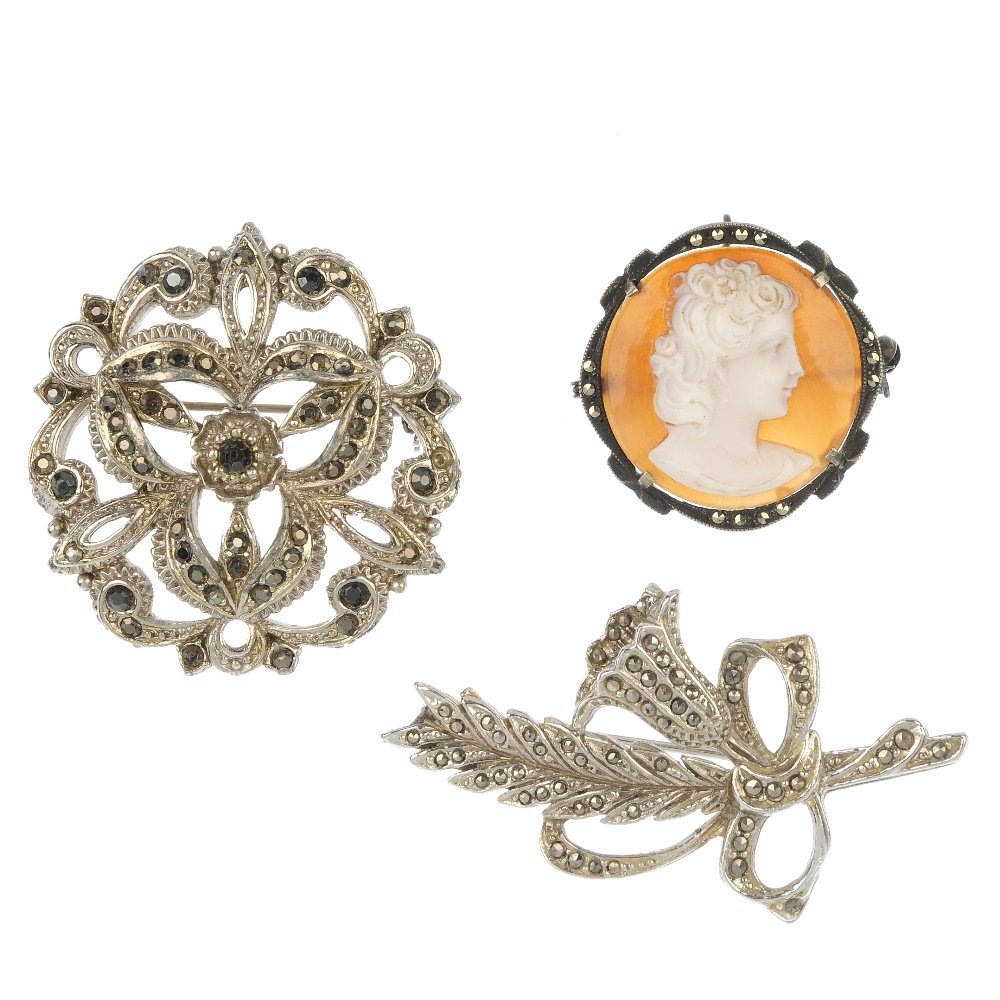 A selection of marcasite jewellery.: A selection of marcasite jewellery, to include many floral and foliate design brooches, earrings and bracelets, a cameo brooch, a watch and eighteen single earrings. (48 excluding single earrings).