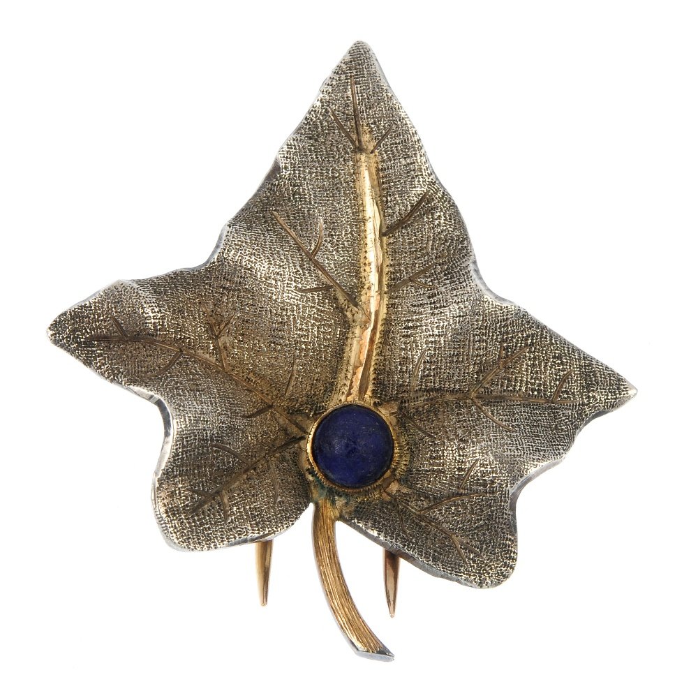 A Buccellati leaf clip, a pair of cufflinks and a: A selection of jewellery, to include a blue-gem leaf clip by Buccellati, a pair of early 20th century cufflinks and a mid 20th century paste dress stud and tie pin set. One dress stud deficient. First
