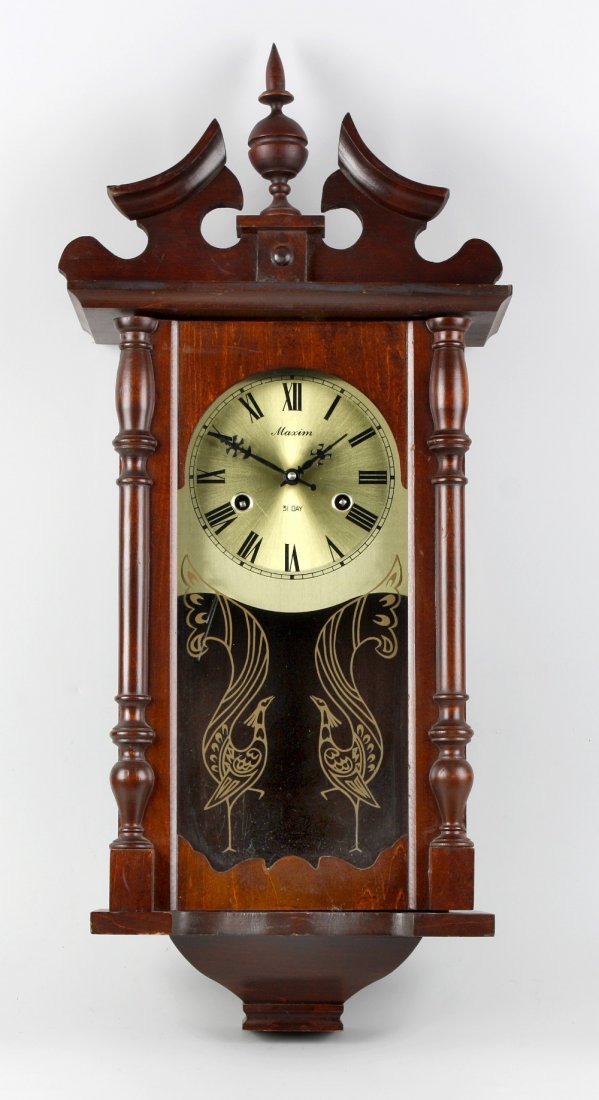 Three assorted wall clocks: Three assorted wall clocks, Comprising a spring-driven Vienna wall clock, a Hermle wall clock, and a Maxim wall clock. (3).