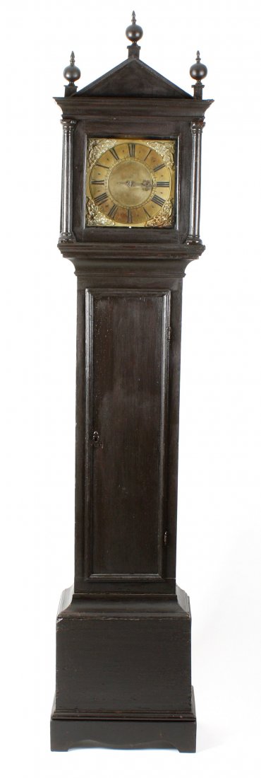 An early 18th century brass dial single-hand longcase c: An early 18th century brass dial single-hand longcase clock, Thomas Johnson, Petworth, the 9.75-inch square dial signed Thos. Johnsons Petworth, with Roman hours, lozenge half hour divisions and inner