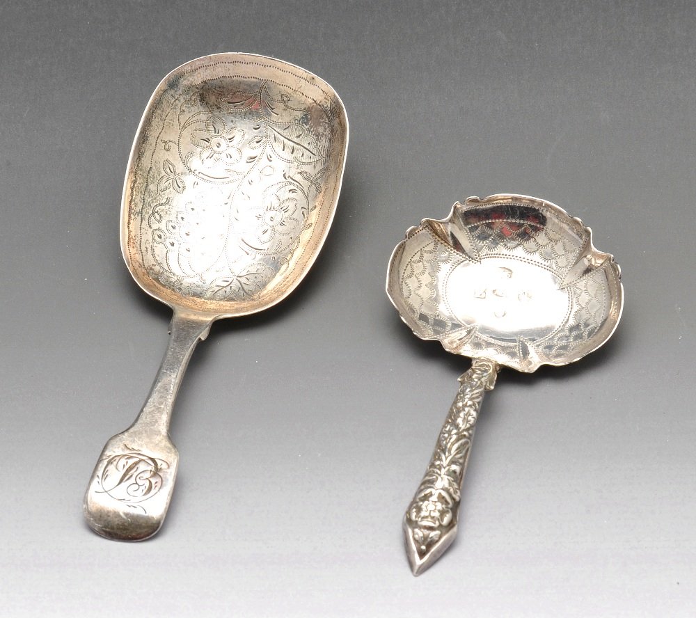 A George III & William IV caddy spoons.: A George III silver caddy spoon, the oval bowl with fluted corners and punch work engraving to the floral stem, hallmarked Joseph Willmore, Birmingham 1797. Together with a William IV silver Fiddle pa