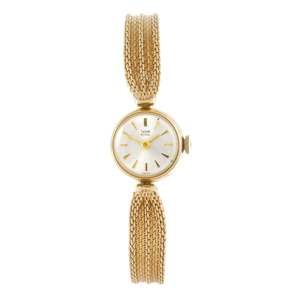 TUDOR - a lady's 9ct gold Royal bracelet watch.: TUDOR - a lady's Royal bracelet watch. Hallmarked Birmingham 1965. Signed manual wind movement. Silvered dial with hour markers. 9ct gold case fitted to an integral 9ct gold bracelet with folding clas