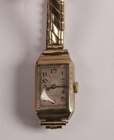 ROLEX - ladies 1930's 9ct gold rectangular watch: ROLEX - ladies 1930's 9ct gold rectangular watch on metal expanding bracelet with arabic dial and 15 jewel Prima movement.