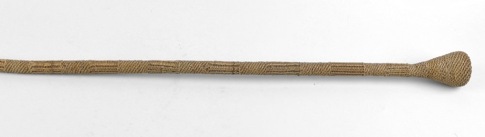 An unusual colonial cane-wrapped walking stick or staff: An unusual colonial cane-wrapped walking stick or staff, the tapering handle over nineteen segments of varying types of cane work, 34" (86.5cm) long.