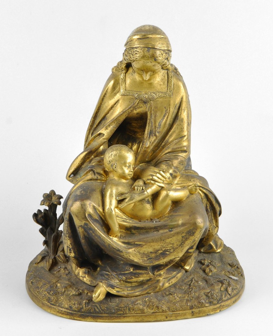 A 19th century gilt bronze figure group: A 19th century gilt bronze figure group, The Virgin (Madonna) and child, Jean-Jules Salmson, (1823-1902), she modelled in seated pose with Christ child upon her lap, the oval base with tablet signatur