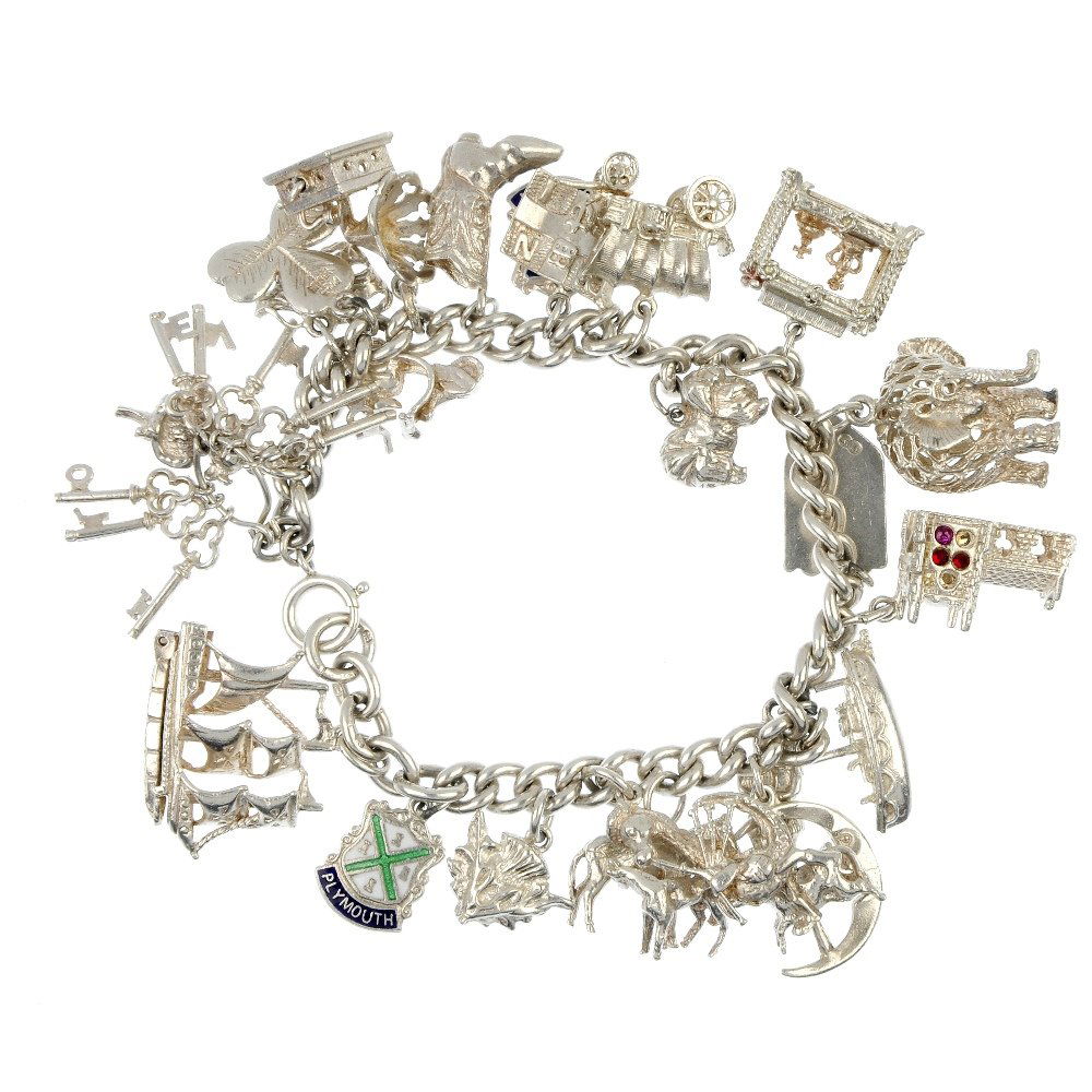 Three charm bracelets.: Three charm bracelets, the curb-link bracelets suspending a total of forty-seven charms, to include a hedgehog and a church. Most with marks to indicate silver. Lengths 18cms. Weight 171.1gms.