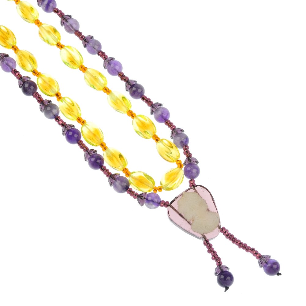 A selection of paste and gem bead necklaces.: A selection of paste and gem bead necklaces, to include an amethyst and purple paste single-strand with paste cameo terminal, a vaseline glass and orange bead necklace, together with two further neckl