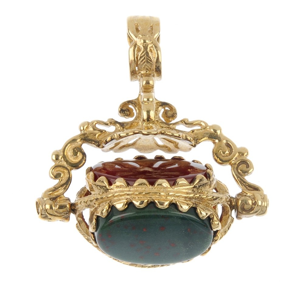 A selection of four fobs.: A selection of four fobs, to include a 9ct gold orange paste swivel fob, a 9ct gold onyx, bloodstone and carnelian swivel fob, an early 20th century carnelian fob, together with a smokey quartz swivel