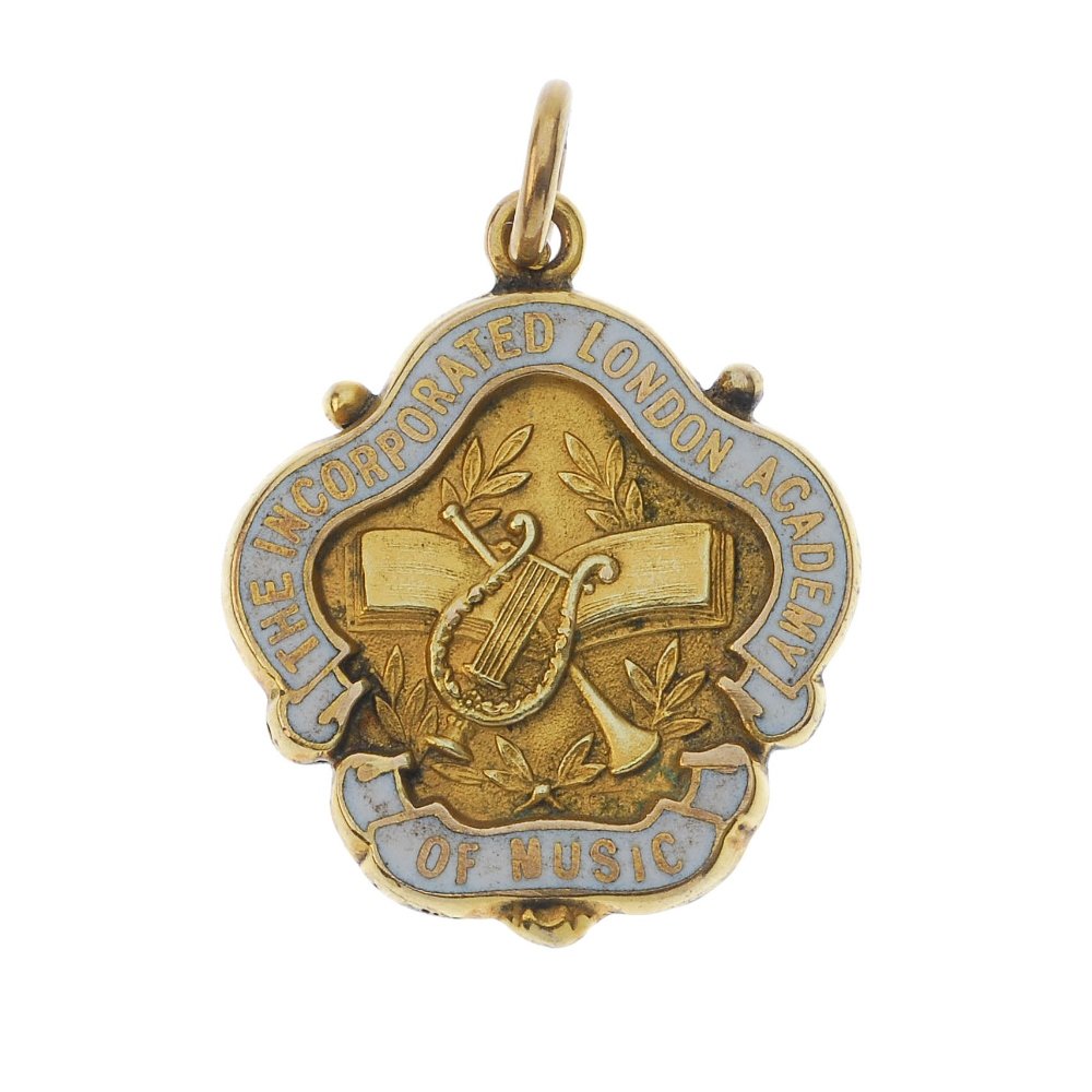 A gold medal, London Academy of Music.: The Incorporated London Academy of Music, gold and enamel badge, by JA Restall, lyre and trumpet over sheet music, legend around on white enamel, rev. engraved 'Elsie VM Roberts Elocution Dec.1930' , 