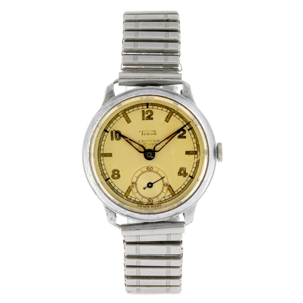TUDOR - a gentleman's stainless steel bracelet watch.: TUDOR - a gentleman's bracelet watch. Reference 631, serial 273764. Signed manual wind movement. Champagne dial with Alternating Arabic numeral and baton hour markers, subsidiary seconds dial to six. 