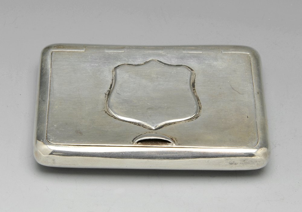 A Victorian silver snuff box.: A Victorian silver snuff box, the oblong form with applied shield to the flush hinge and opening to a silver-gilt interior. Hallmarked Thomas Johnson II, London 1880. Length measuring 3 ¼ inches (8 c
