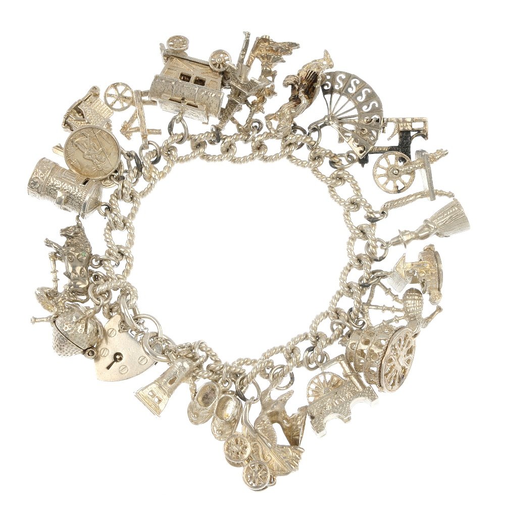 A selection of four silver and white metal charm: Four silver and white metal charm bracelets. The curb and fancy-link chains, suspending a total of forty-seven charms, to include a charging bull, a frog and a trumpet, to the heart-shape padlock clas