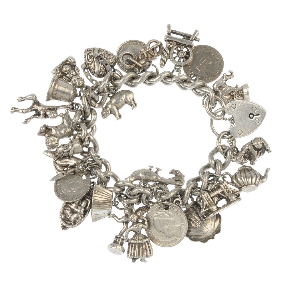 A selection of three charm bracelets.: A selection of three charm bracelets. To include one spiral rope-twist trace-link and two curb-link chains, suspending a total of fifty-seven charms. Many with marks indicating silver. Length approxim