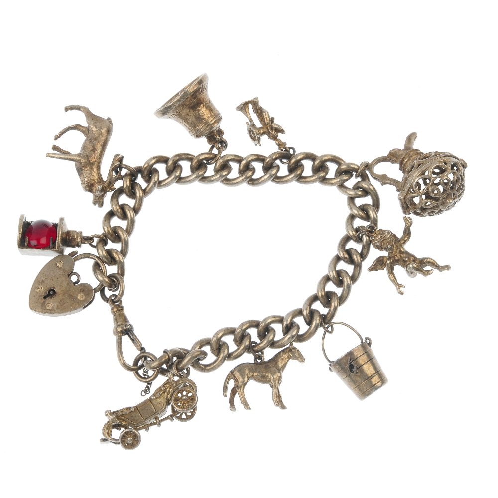 A selection of three charm bracelets.: A selection of three charm bracelets. Each designed as a curb or double-curb-link chain, suspending a total of twenty-six charms, to include a bear and a greyhound. Most with marks indicating silver. 