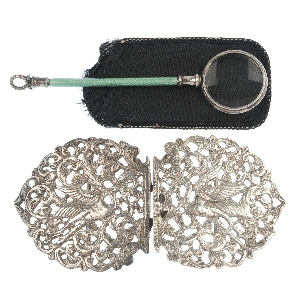 Four silver items.: Four silver items. To include an early 20th century silver and green enamel magnifying glass, an early 20th century silver blue enamel heart pill box, together with a mid 20th century silver box and a