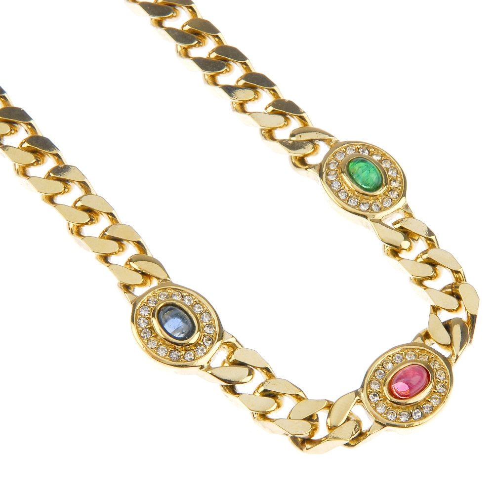 CHRISTIAN DIOR - a necklace and matching earrings.: CHRISTIAN DIOR - a matching necklace and earring set. The necklace designed as a trilogy of collet set coloured paste, each surrounded by a series of colourless paste to the flat curb-link chain, toge