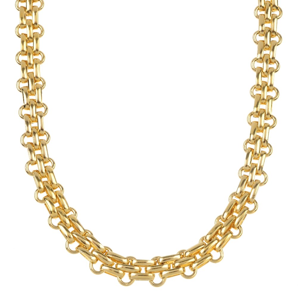 CHRISTIAN DIOR - a necklace and bracelet.: CHRISTIAN DIOR - a necklace and bracelet. The necklace designed as a gate-link chain, together with a bracelet designed as a skewed gate-link chain. Signed Chr. Dior. Lengths 38.5 and 19.1cms.