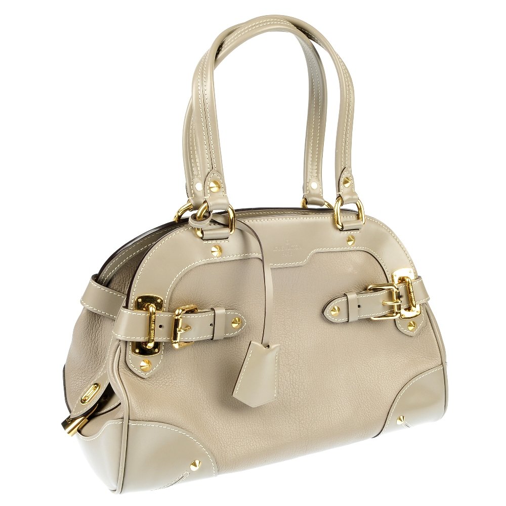 LOUIS VUITTON - a Suhali leather Le Radieux satchel: LOUIS VUITTON - a suhali leather Le Radieux satchel. Featuring a textured leather exterior with smooth leather trim, double flat handles, gold-tone hardware to include side buckles and protective stud