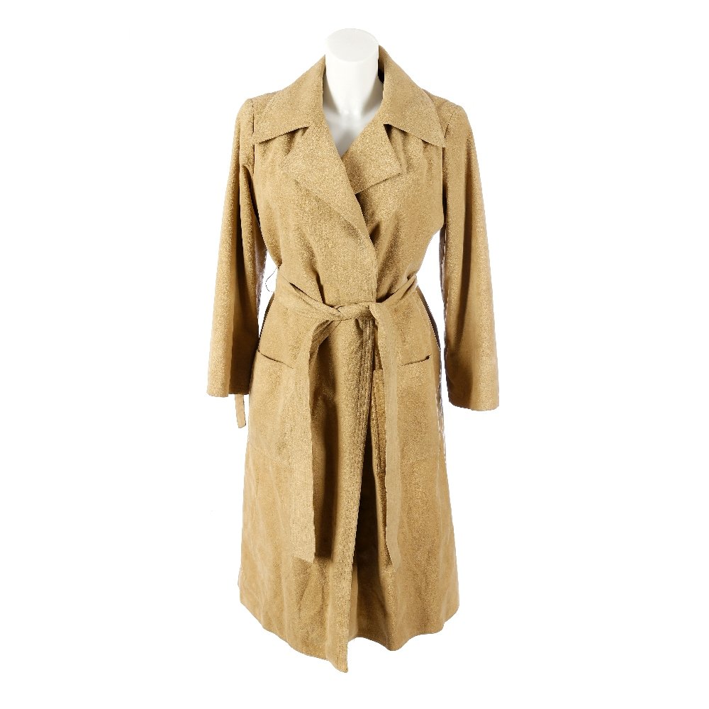 A suede coat with detachable mink lining, fur collar: A full-length beige suede trench coat. Designed with a fully detachable ranch mink lining, lapel collar, two outer patch pockets, single push button and suede belt fastening, together with a ranch min