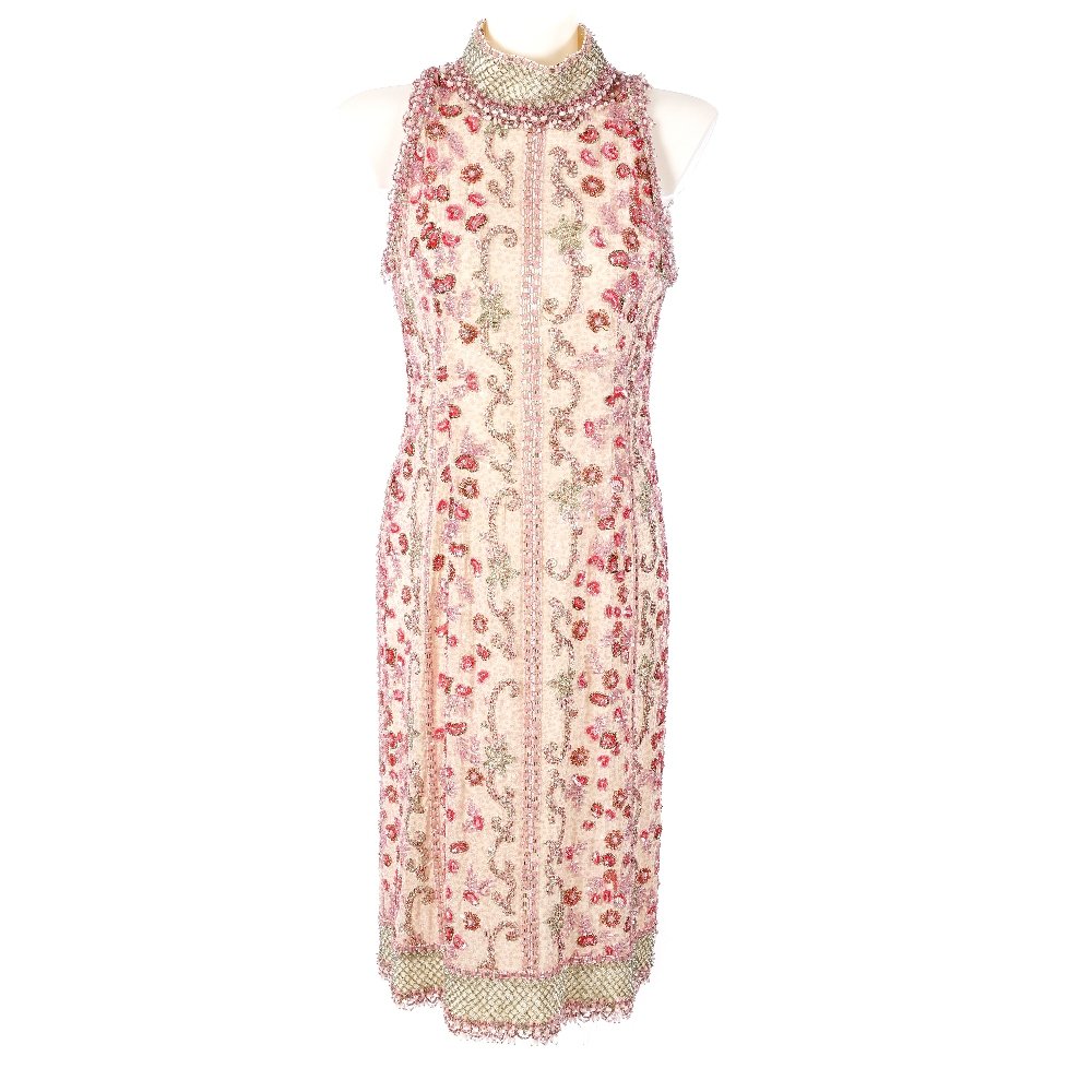 Two dresses and a silk shawl.: Two dresses and a silk shawl. To include a heavily beaded pink sleeveless dress with choker style collar, together with a silver dress with a deep V neckline by Gunex, and a pink silk shawl.