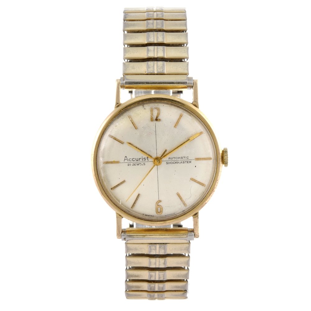 ACCURIST - a gentleman's 9ct yellow gold bracelet: ACCURIST - a gentleman's bracelet watch. Hallmarked London 1972. Signed automatic movement. Silvered dial with baton hour markers. 9ct yellow gold case fitted to an unsigned gold plated expandable bra