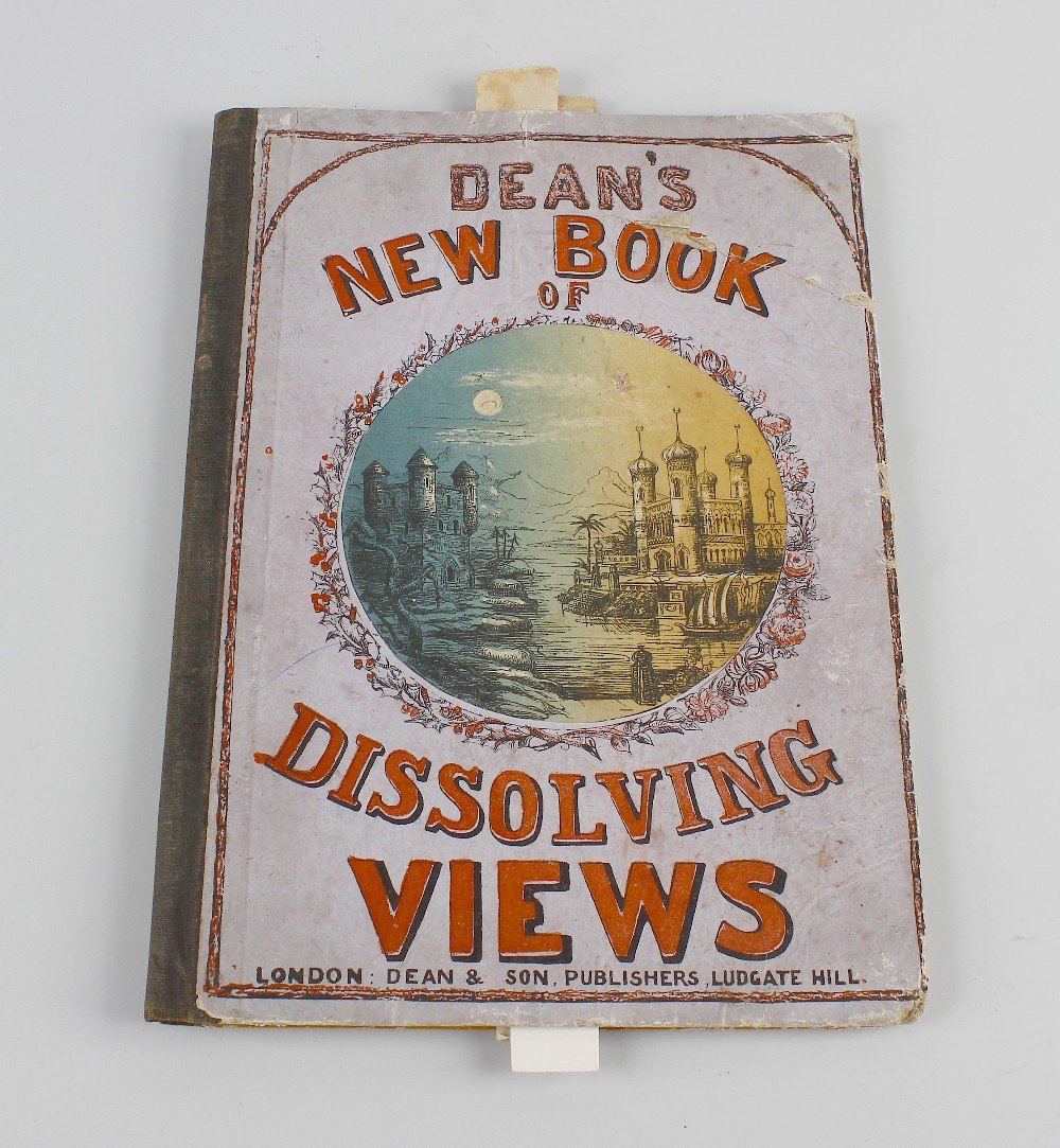 'Dean's New Book of Dissolving Views': 'Dean's New Book of Dissolving Views', published by Dean & Son Printers & Publishers, 11 Ludgate Hill, London. The six plates having Venetian blind slat mechanism depicting 'Land/Sea', Day/Night, 'Sum
