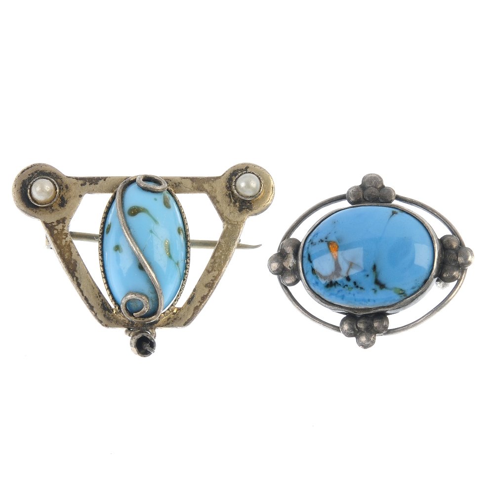 A selection of early 20th century jewellery.: A selection of early 20th century jewellery. To include a bar brooch, the bird and foliate design set with blue and red pastes to the plain bar, together with a circular colourless paste brooch. (9) M