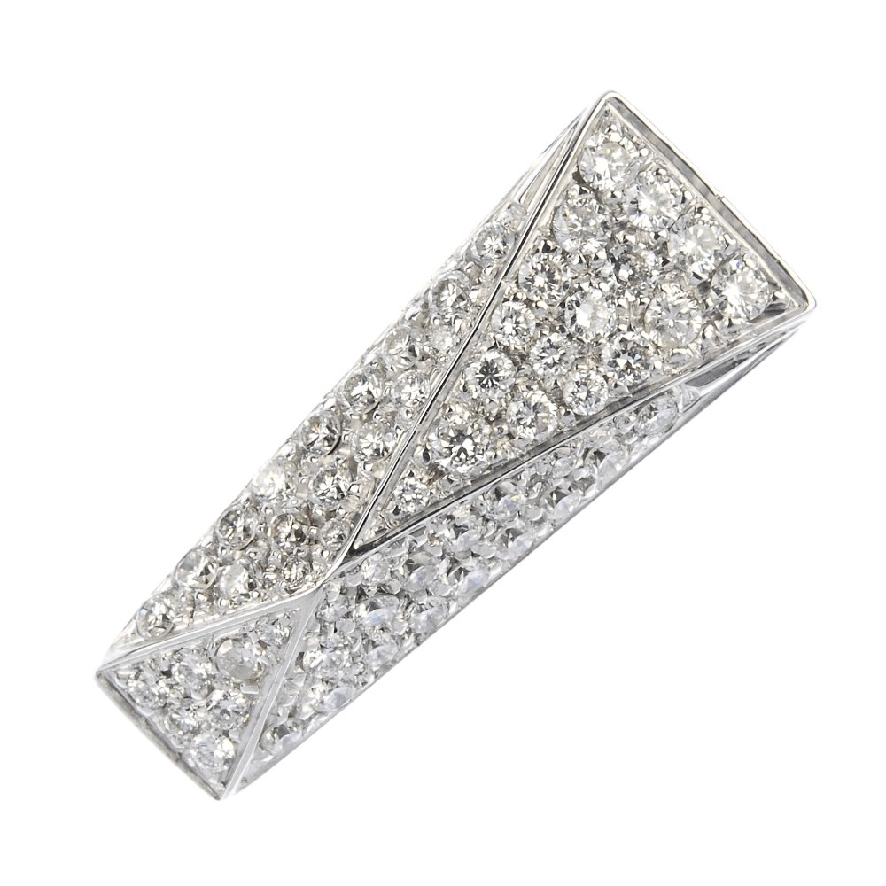 VERSACE - a diamond dress ring.: VERSACE - a diamond dress ring. The pave-set brilliant-cut diamond tapered panel, to the shaped band. Signed Versace. Estimated total diamond weight 0.55ct. Italian marks. Weight 9.7gms.