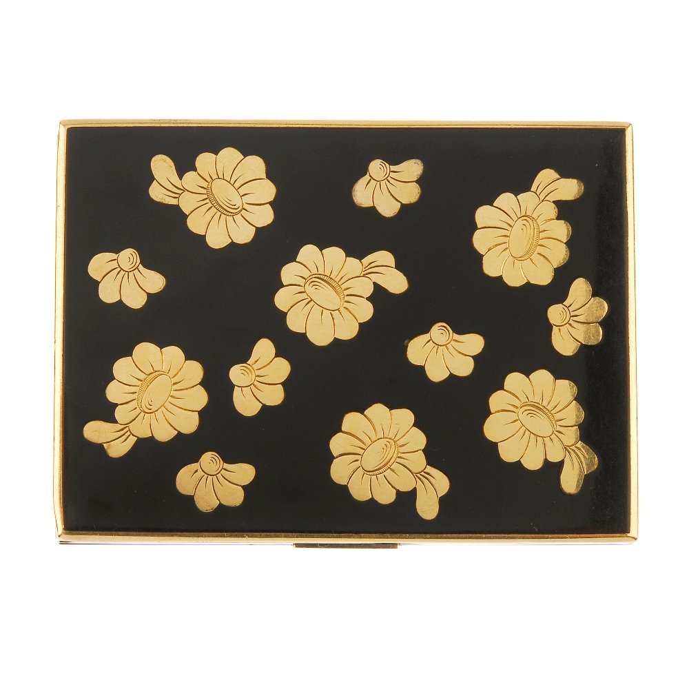 VAN CLEEF & ARPELS - a 1940s silver and gold, enamel: VAN CLEEF & ARPELS - a 1940s silver and gold, enamel compact. Of rectangular outline, the black enamel case with gold edging and engraved floral motif to the lid, opening to reveal a mirror and black
