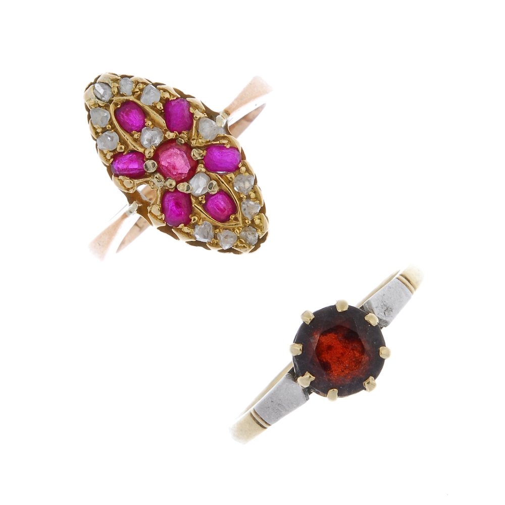 Two gem-set rings.: Two gem-set rings. To include a circular-shape ruby and rose-cut diamond, marquise shape panel ring and a circular-shape garnet single-stone ring. One diamond deficient. Weight 6.3gms.