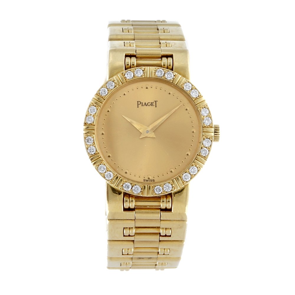 PIAGET - a lady's 18ct yellow gold Dancer bracelet: PIAGET - a lady's Dancer bracelet watch. 18ct yellow gold case with factory diamond set bezel. Numbered 80564 K 81 509170. Unsigned quartz movement. Champagne dial with dot hour markers. Fitted to a s