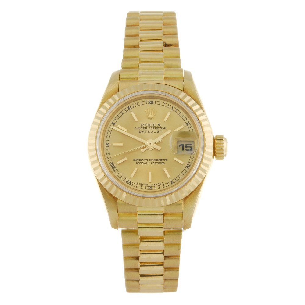 ROLEX - a lady's 18ct yellow gold Oyster Perpetual: ROLEX - a lady's Oyster Perpetual Datejust bracelet watch. Circa 2000. 18ct yellow gold case with fluted bezel. Reference 79178, serial P986821. Signed automatic calibre 2235. Champagne dial with bato