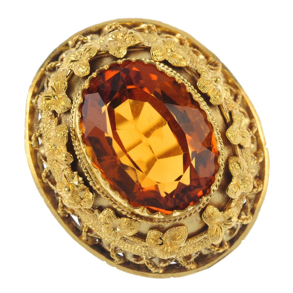 A citrine single-stone dress ring. (1 of 4)