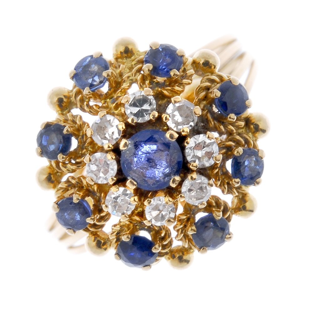 A sapphire and diamond cluster ring. (1 of 4)