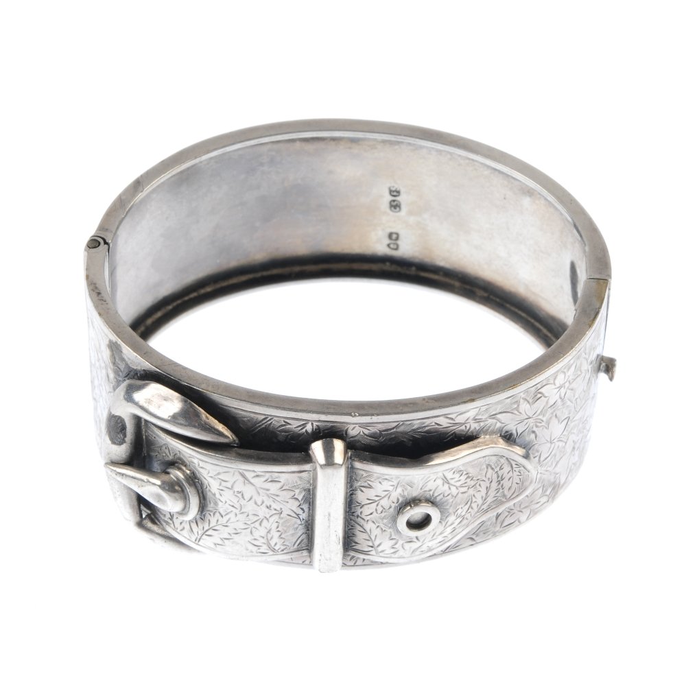 A late Victorian silver hinged bangle. (1 of 3)