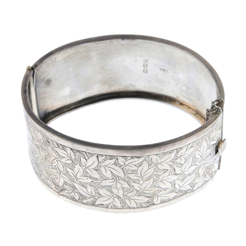 A late Victorian silver hinged bangle. (1 of 3)