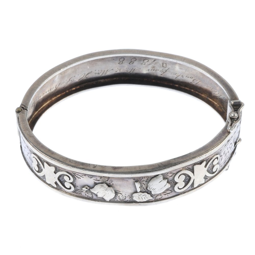 A late Victorian silver hinged bangle. (1 of 3)