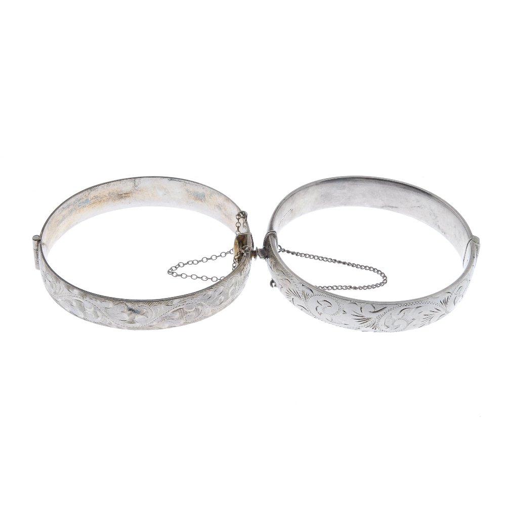A selection of silver and white metal bangles. (1 of 2)