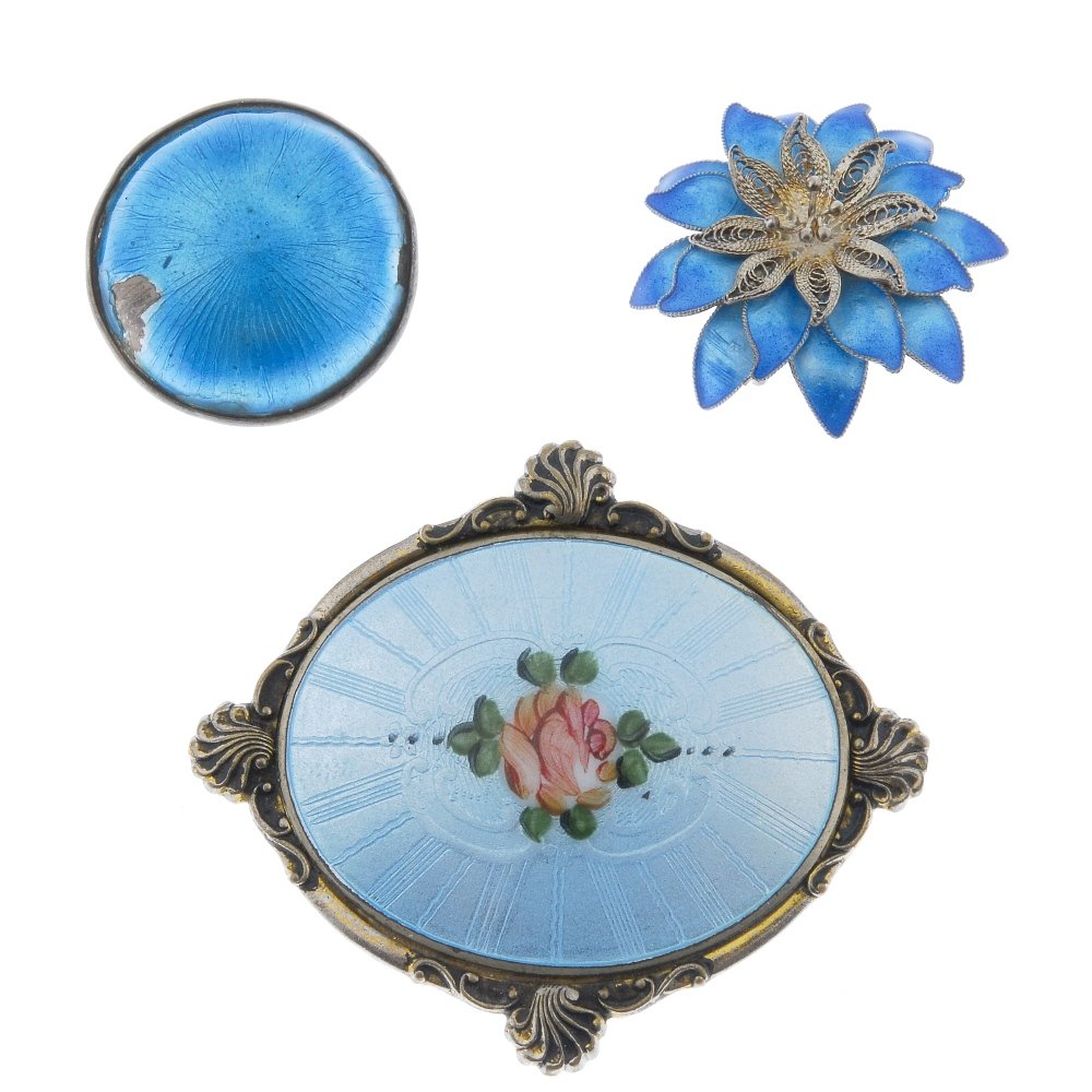Six items of enamel jewellery.: A selection of six enamel brooches. To include a silver floral enamel bar brooch, attributed to Bernard Instone and a silver Charles Horner floral bar brooch, with a four further enamel brooches. Thre