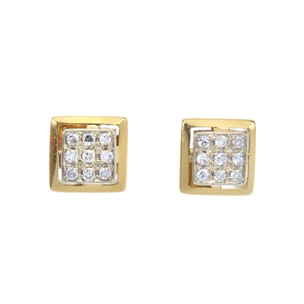 A pair of diamond ear studs. (1 of 2)