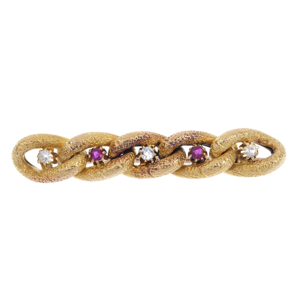 An early 20th century gold ruby and diamond brooch. (1 of 2)