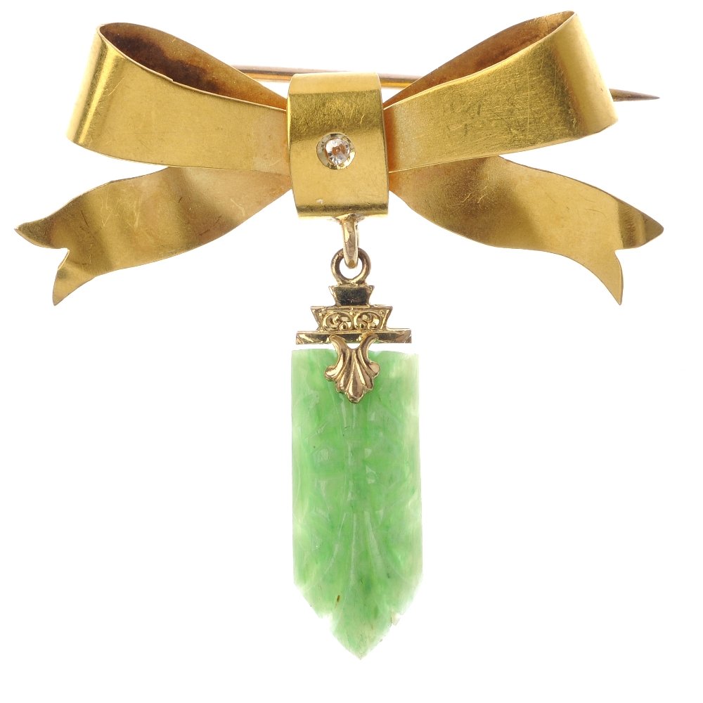 A gold diamond and paste brooch. (1 of 2)