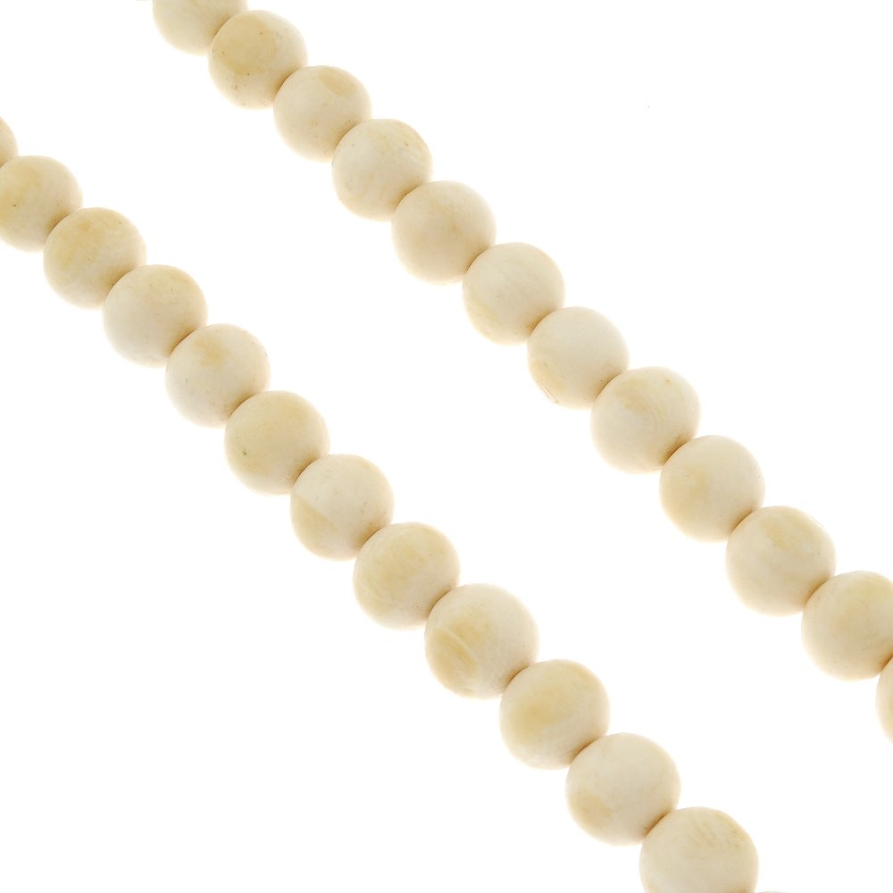 Two early 20th century ivory necklaces. (1 of 3)
