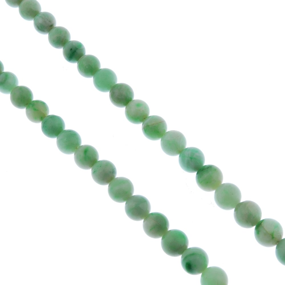 Three items of jade jewellery. (1 of 3)